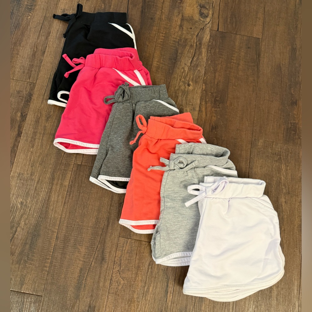 6 pairs of Colorful Girls Lounge Shorts with pockets. Size 14/16, never worn.